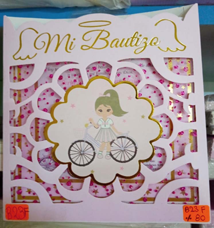 TARJETA MI BAUTIZO NIÑA CON BICIBLETA  EN TROQUELADO B23F