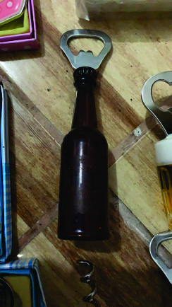 ABRIDOR BOTELLA MARRON
